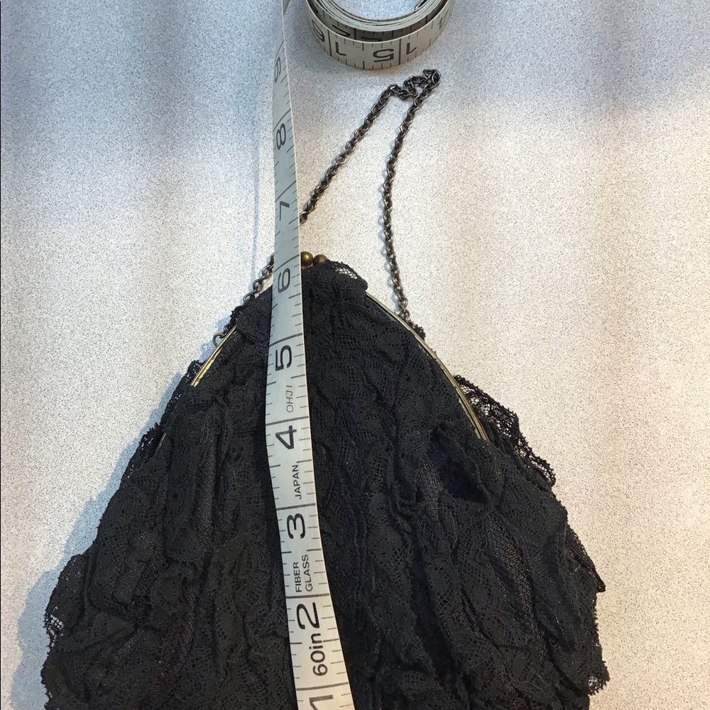 Vintage black lace purse with snap closure